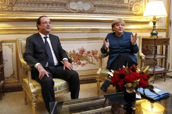 French President Hollande and German Chancellor Merkel meet at the Elysee Palace, in Paris