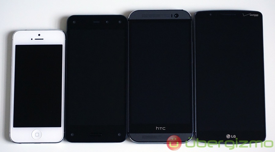 Size comparison: iPhone 5, Fire Phone, HTC One (M8), and LG G3.